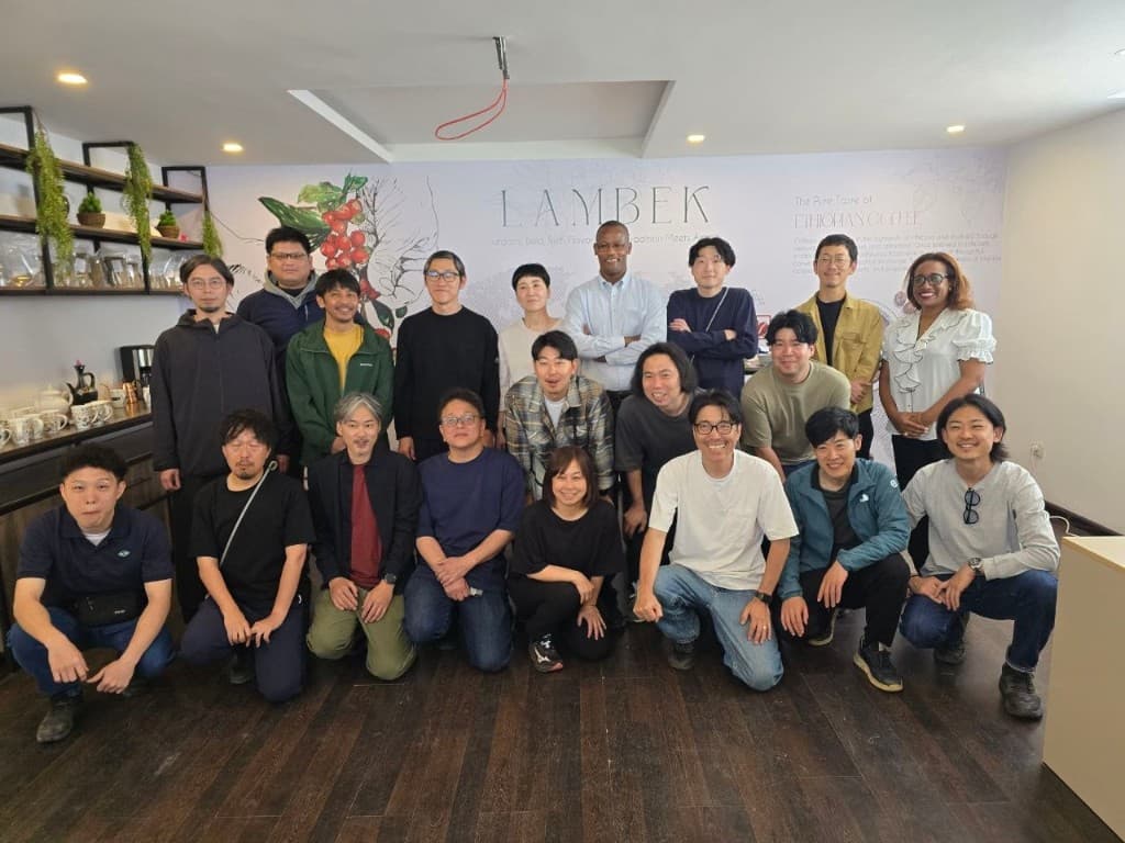 Lambek Coffee team and international partners gathered at the Lambek showroom